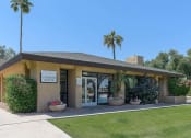 Thumbnail 31 of 36 - the front of a building with palm trees
