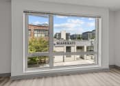 Thumbnail 8 of 28 - a large window in a room with a city view