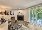 Thumbnail 13 of 18 - Align Apartments Model Living Room with Fireplace