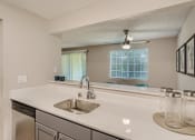 Thumbnail 10 of 18 - Align Apartments Model Kitchen Counter and Dining Room