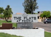 Thumbnail 36 of 36 - a sign for the flats in front of a parking lot