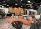 Thumbnail 7 of 19 - The Hemlock Apartments in Seattle, Washington Clubhouse Lounge with Games at The Hemlock, Seattle, Washington