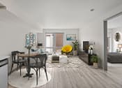 Thumbnail 1 of 28 - a living room and dining room with a table and chairs