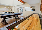Thumbnail 2 of 10 - A bowling alley is set up in a modern kitchen.