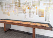 Thumbnail 20 of 30 - ArcCentral_Beaverton_OR_Amenity_CommunityRoomShuffleboard