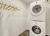 Thumbnail 7 of 30 - Sparc Apartments Closet and Washer and Dryer