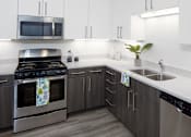 Thumbnail 5 of 18 - Boathouse Apartments Model Kitchen