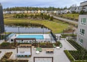 Thumbnail 38 of 48 - a view of a pool and a pond in a building
