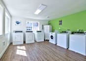 Thumbnail 26 of 36 - Parc East Apartments laundry room