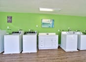 Thumbnail 25 of 36 - Parc East Apartments laundry room