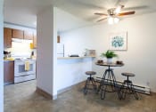 Thumbnail 17 of 26 - Arborpointe Apartments Model Kitchen and Dining Area