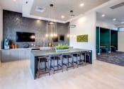 Thumbnail 17 of 30 - Solace at Rainier Ridge Apartments Clubhouse Kitchen