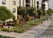 Thumbnail 4 of 9 - a rendering of a park with a river and buildings