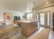 Thumbnail 27 of 35 - the preserve at ballantyne commons apartment kitchen and living room