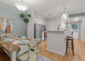 Thumbnail 2 of 45 - Badger Mountain Ranch Apartments in Richland, Washington Model Dining Room and Kitchen