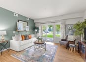 Thumbnail 1 of 45 - Badger Mountain Ranch Apartments in Richland, Washington Model Living Room with Private Patio