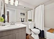 Thumbnail 10 of 27 - The Lakehouse Apartments Model Bathroom