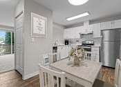 Thumbnail 3 of 21 - Bayview Apartment Homes in Federal Way, Washington Model Kitchen