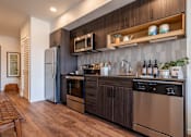 Thumbnail 15 of 28 - BEAM Apartments Model Kitchen