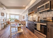 Thumbnail 2 of 28 - BEAM Apartments Model Kitchen