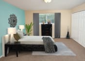 Thumbnail 5 of 5 - a bedroom with a bed and a dresser