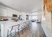 Thumbnail 8 of 13 - BLVD 120 Townhomes in Pleasant Grove, Utah Model Kitchen with Large Island