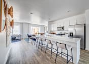 Thumbnail 3 of 13 - BLVD 120 Townhomes in Pleasant Grove, Utah Model Kitchen with Large Island