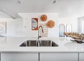 Thumbnail 6 of 13 - BLVD 120 Townhomes in Pleasant Grove, Utah Model Kitchen