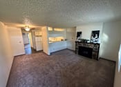 Thumbnail 1 of 30 - Clearwater Square Apartments in Kennewick, Washington Living Room with Fireplace