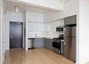 Thumbnail 14 of 18 - Crane Flats and Lofts Model Kitchen