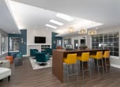 Thumbnail 11 of 39 - Novela Apartments Clubroom Counter and Seating with Television