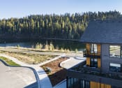 Thumbnail 1 of 31 - Bo Apartments exterior building and walking trail