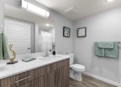 Thumbnail 7 of 30 - a bathroom with a toilet sink and a mirror