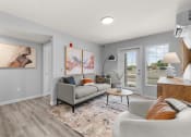 Thumbnail 3 of 30 - a living room with grey walls and a couch and a table