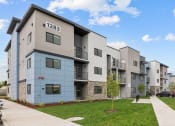 Thumbnail 30 of 30 - exterior shot of district 208 apartments