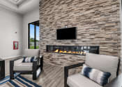 Thumbnail 20 of 30 - indoor seating area with fireplace