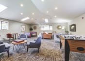 Thumbnail 5 of 24 - Duet Apartments in Lynnwood, Washington Clubhouse Lounge with Games