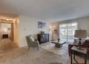 Thumbnail 8 of 11 - Eagle Rock Model Living Room with Private Patio