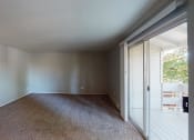 Thumbnail 2 of 16 - Eleven Pines Living Room with Private Patio
