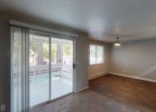 Thumbnail 3 of 16 - Eleven Pines Living Room and Dining Room with Private Patio