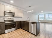Thumbnail 16 of 29 - Geo Apartments Vacant Kitchen