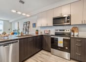 Thumbnail 1 of 29 - Geo Apartments Model Kitchen