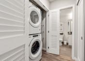 Thumbnail 19 of 29 - Geo Apartments Model Laundry Area