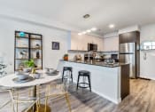 Thumbnail 4 of 29 - Geo Apartments Model Dining Room