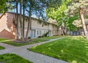 Thumbnail 4 of 15 - Curtis Apartments exterior walkways