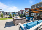 Thumbnail 8 of 21 - the preserve at ballantyne commons clubhouse with fire pit and lounge furniture