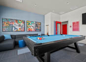 Thumbnail 5 of 21 - a games room with a pool table and a tv