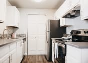 Thumbnail 21 of 41 - GoGo Heights Apartments Model Kitchen