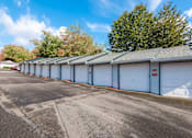 Thumbnail 25 of 25 - Large garages at  Heron Hills apartments in Gresham Oregon.