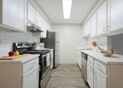 Thumbnail 3 of 39 - Novela Apartments Full Kitchen view